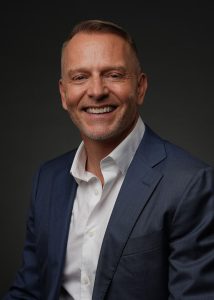 Dave Karraker Suit Smiling 1